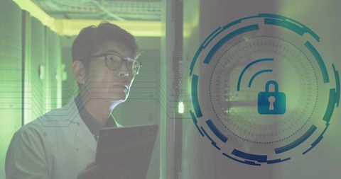 Technician Analyzing Data Security in High-Tech Server Room - Download Free Stock Images Pikwizard.com