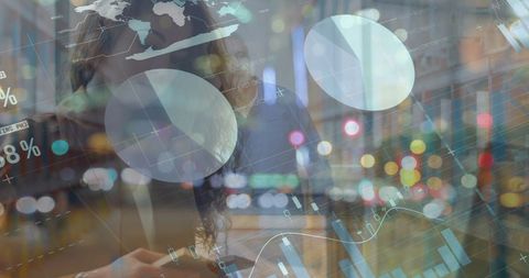 Double exposure of businesswoman analyzing data with technology