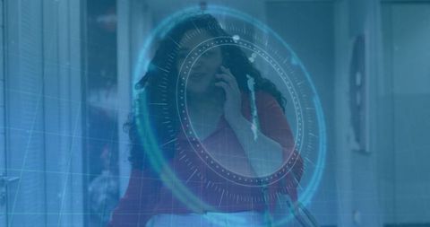 Businesswoman using smartphone with futuristic digital interface