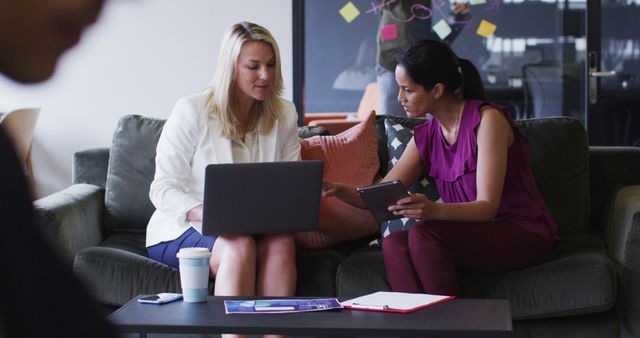 Businesswomen Collaborating on a Project in Modern Office - Download Free Stock Images Pikwizard.com