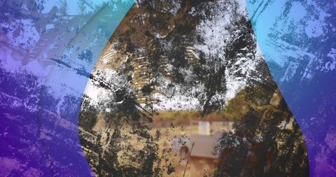 Teardrop cutout framing blurred rural landscape with grunge and purple-cyan gradient