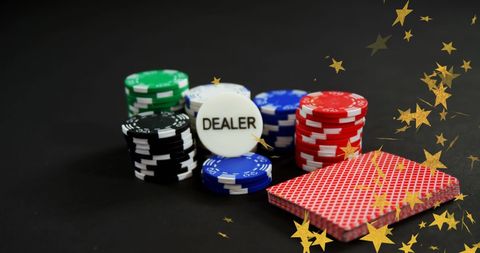 Colorful Poker Chips with Dealer Button on Black Background - Download Free Stock Images Pikwizard.com