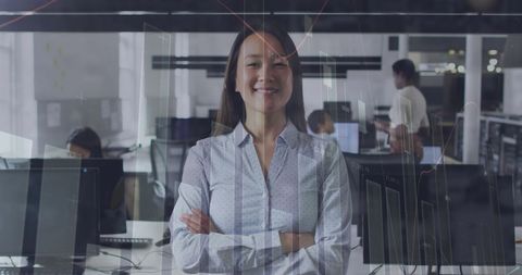 Confident businesswoman with digital graphs and charts