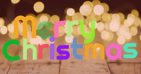 Colorful Merry Christmas Text with Festive Light Bokeh
