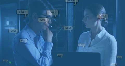 Diverse it team overseeing server room amid digital humor