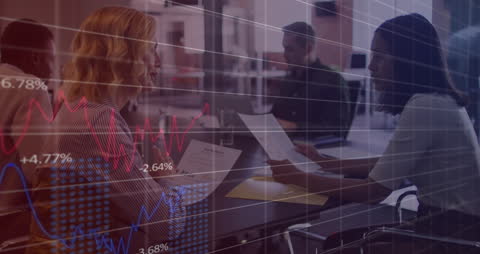 Business Team Analyzing Financial Data with Overlay Charts