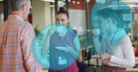 Business Professionals Networking in Lounge Over Coffee