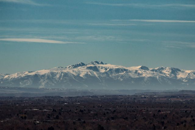 Snow-Capped Mountain Range in Clear Blue Sky - Download Free Stock Images Pikwizard.com