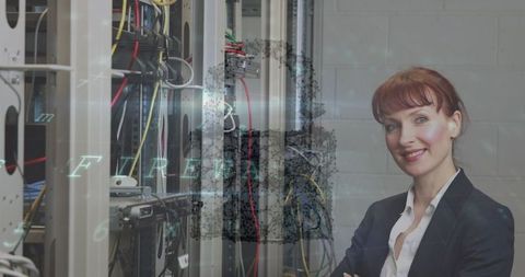 Confident Businesswoman Standing in Server Room