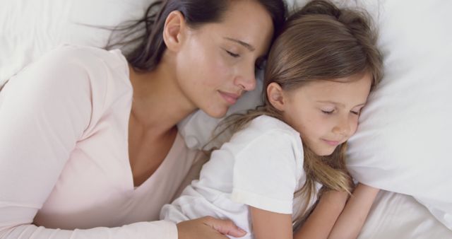 Mother and Daughter Sleeping Peacefully Together - Download Free Stock Images Pikwizard.com