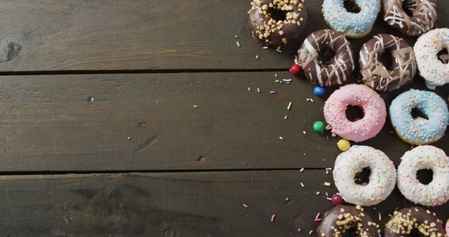Assorted Colorful Donuts on Wooden Background - Download Free Stock Images Pikwizard.com