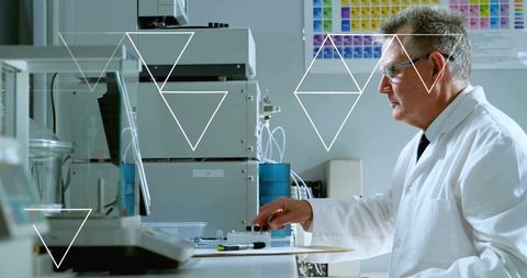 Experienced scientist conducting research in modern laboratory