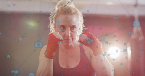 Empowered Female Boxer Training with Digital Overlay