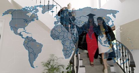 Graduates descending spiral staircase celebrating graduation with global network overlay