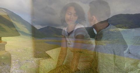 Double exposure couple on bed blending with mountain lake landscape, intimate mood