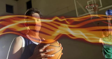 Basketball Player in Gym with Motion and Energy Light Effects