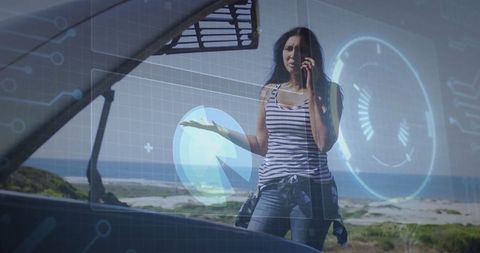 Woman seeking roadside assistance with futuristic digital interface