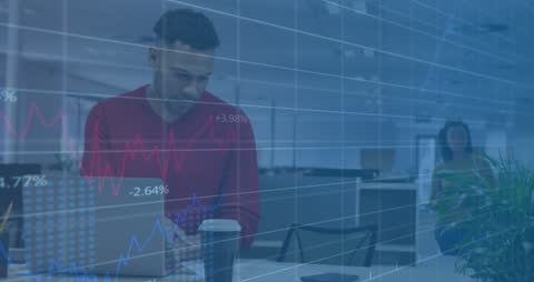 Man Analyzing Financial Data on Laptop with Graph Overlay