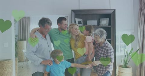 Joyful multigenerational family gathering at home with overlay hearts