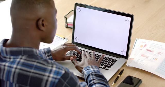 Businessman Working on Laptop in Home Office, Analyzing Data - Download Free Stock Images Pikwizard.com