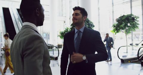 Diverse Casual Businessmen Meeting in Corporate Lobby - Download Free Stock Images Pikwizard.com