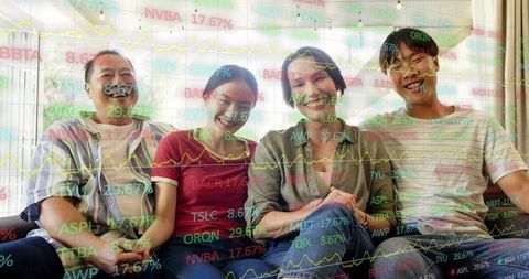 Family watching stock market overlay on living room couch, smiling and monitoring markets