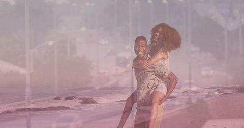 Smiling couple sharing piggyback on pastel beach at sunset, dreamy coastal romance