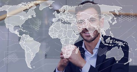 Executive smiling behind transparent world map overlay showing global business connectivity