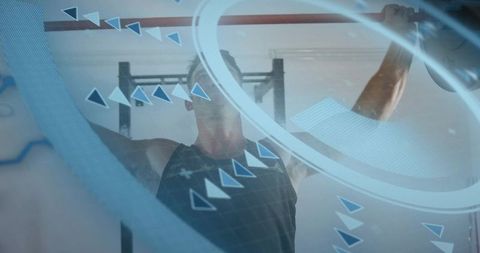 Athlete performing pull-up with futuristic hud overlays in high-tech gym strength training
