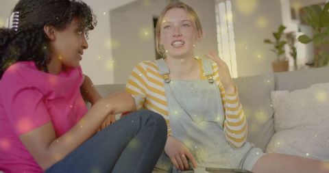 Diverse Teenage Friends Chatting Casually at Home with Light Effects