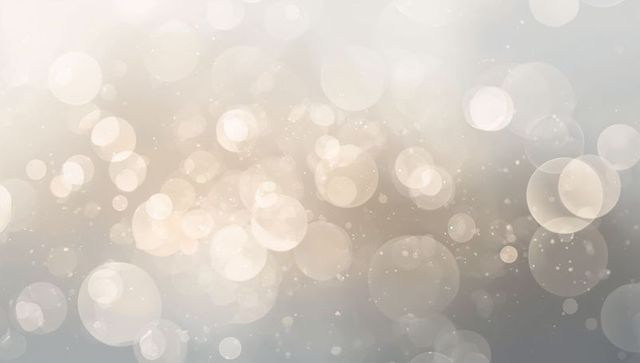 Soft champagne bokeh lights background — dreamy golden orbs and subtle glow texture