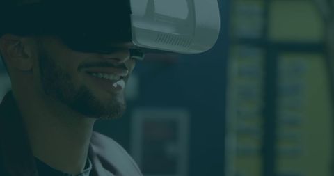 Man experiencing virtual reality world with headset