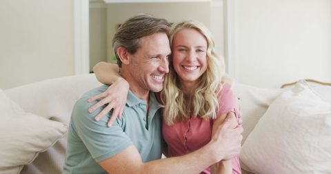 Smiling Caucasian Couple Enjoying Time Together at Home