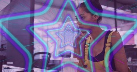 Focused office worker with futuristic neon effects