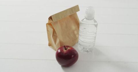 Healthy Lunch Concept with Paper Bag and Fresh Apple and Water Bottle - Download Free Stock Images Pikwizard.com