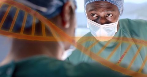 Diverse Surgeons Analyzing DNA Data in Operating Room