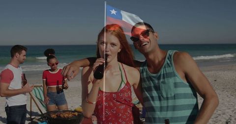 Friends Relaxing on Sunny Beach with Chilean Flag