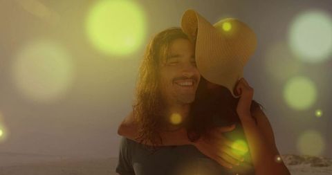 Romantic Beach Sunset Embracing Couple with Straw Hat