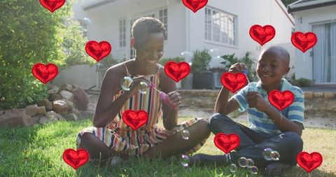 Mother and Son Bonding with Hearts and Bubbles Outside