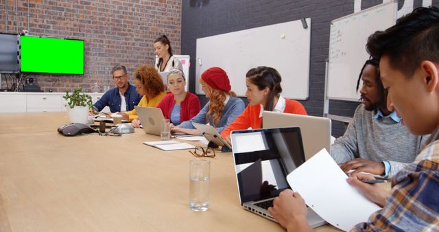 Diverse Team Collaborating in Modern Office During Meeting - Download Free Stock Images Pikwizard.com