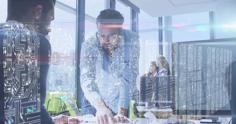 Innovative Business Meeting in Technology-Themed Workspace