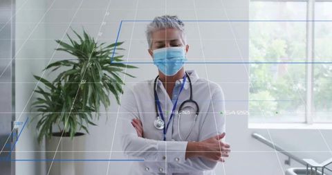 Senior Female Doctor with Stethoscope in Modern Clinic Setting
