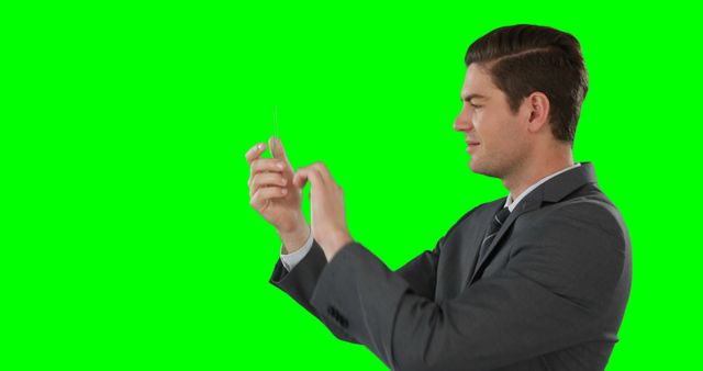 Businessman in Suit Using Smartphone on Green Screen - Download Free Stock Images Pikwizard.com