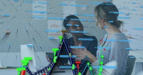 Business professionals collaborating over holographic 3d data visualization in modern office