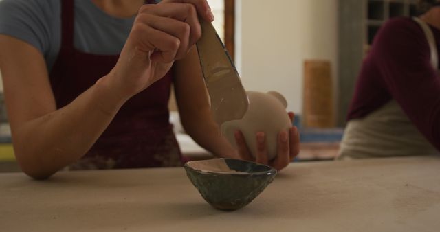 Close-Up of Artisans Crafting Pottery in a Workshop - Download Free Stock Images Pikwizard.com