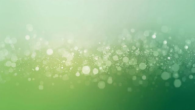 Soft green bokeh band with sparkling light particles and smooth gradient glow for backgrounds