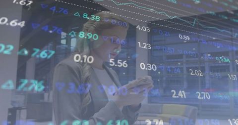 Businesswoman Analyzing Financial Data with Smartphone Overlay - Download Free Stock Images Pikwizard.com