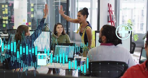 Diverse Team Analyzing Digital Finances in Modern Office