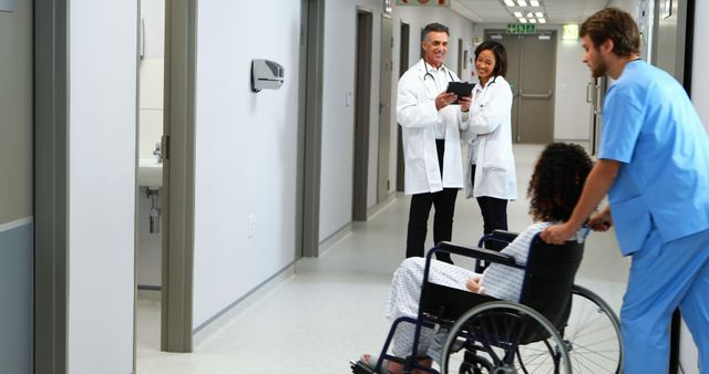 Medical Professionals Assisting Patient in Wheelchair - Download Free Stock Images Pikwizard.com