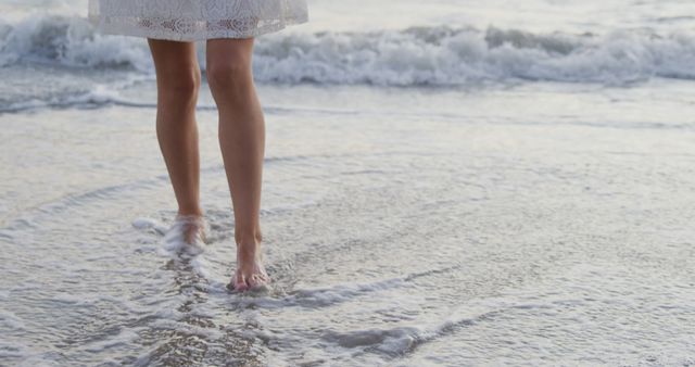 Woman's Bare Feet Walking on Seashore Creating Tranquil Moment - Download Free Stock Images Pikwizard.com